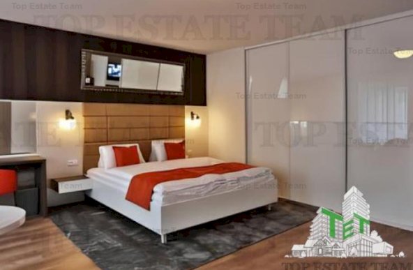 Hotel + spatii comerciale