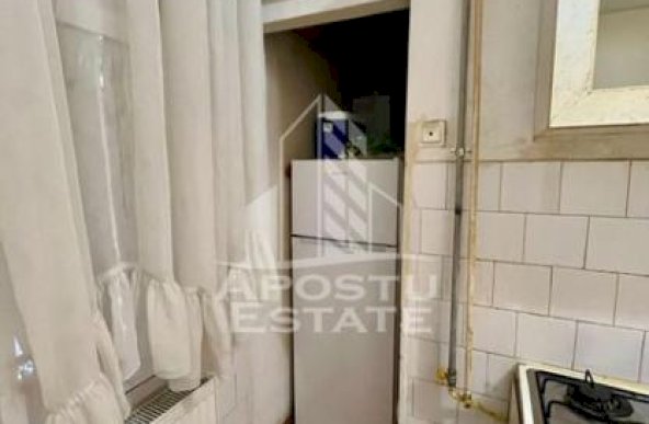 Apartament 1 camera,parter,centrala proprie,zona Timocului