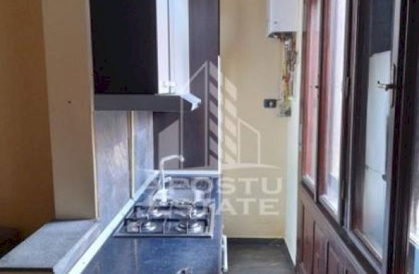 Apartament cu doua camere ,AC,centrala proprie,cladire istorica