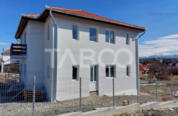 Casa individuala pentru 2 familii 6 camere 720 mp curte Cisnadie