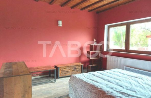 Casa deosebita amplasata intre dealuri la 25 km de Sibiu zona Toparcea