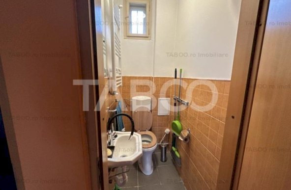 Casa 2 corpuri P+M si P+1 spatiu comercial 70 mpu la strada 2 garaje 