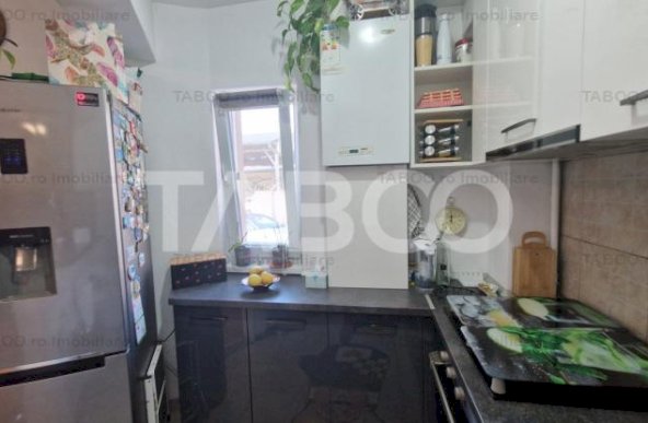 Apartament 3 camere cu 2 balcoane garaj parcare si curte Turnisor