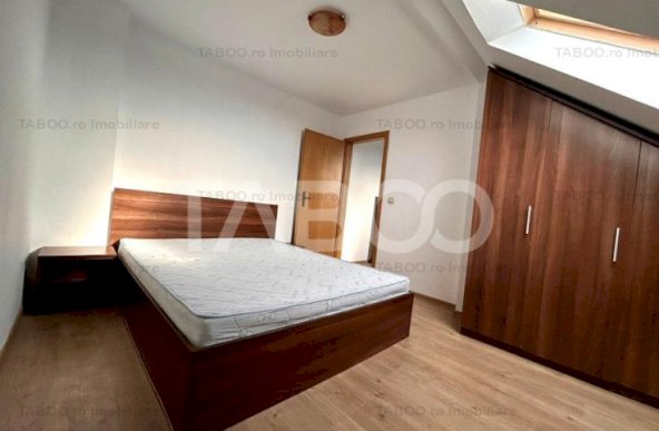 Mansarda 3 camere suprafata 71 mpu bucatarie inchisa zona Strand Sibiu