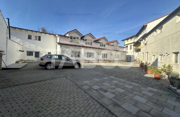 Apartament de vanzare 54 mpu curte si parcare privata Piata Cluj