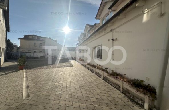 Apartament de vanzare 54 mpu curte si parcare privata Piata Cluj