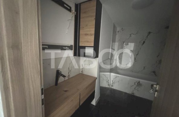 Apartament decomandat cu 2 camere 2 bai 56 mpu balcon loc parcare