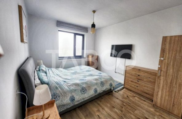 Apartament 3 camere 2 bai de vanzare zona Tractorul loc de parcare